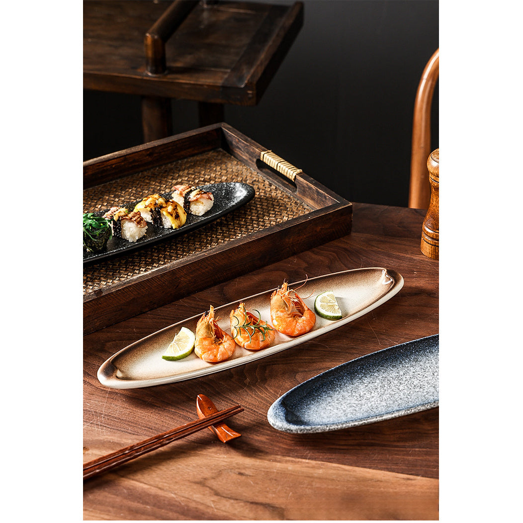 A Creatively Designed Large Oval Plate for Sushi, Sashimi, And Egg Dishes, Perfect for Restaurant Presentations And Wine Business Events