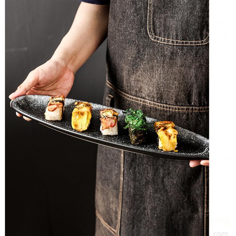 A Creatively Designed Large Oval Plate for Sushi, Sashimi, And Egg Dishes, Perfect for Restaurant Presentations And Wine Business Events