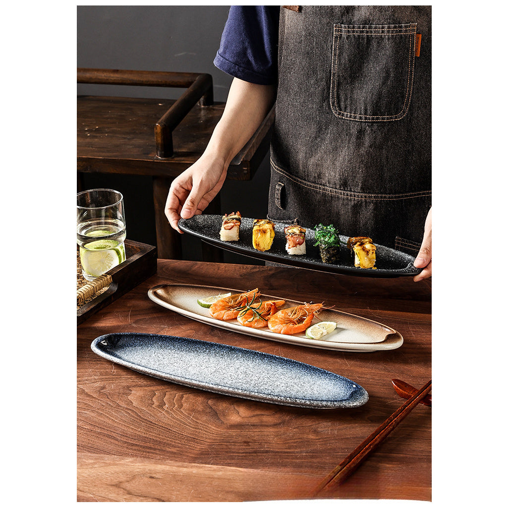 A Creatively Designed Large Oval Plate for Sushi, Sashimi, And Egg Dishes, Perfect for Restaurant Presentations And Wine Business Events