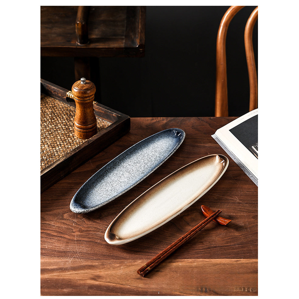 A Creatively Designed Large Oval Plate for Sushi, Sashimi, And Egg Dishes, Perfect for Restaurant Presentations And Wine Business Events