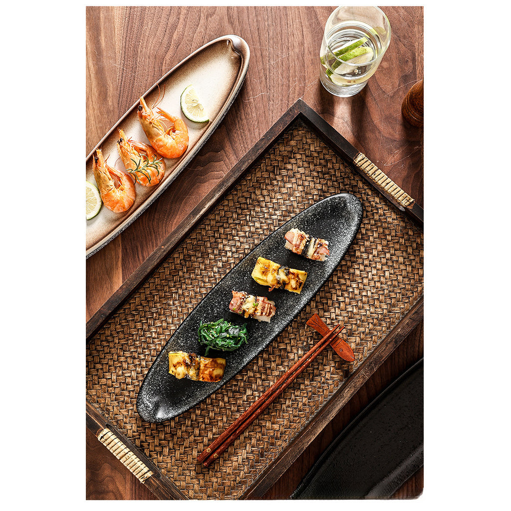 A Creatively Designed Large Oval Plate for Sushi, Sashimi, And Egg Dishes, Perfect for Restaurant Presentations And Wine Business Events